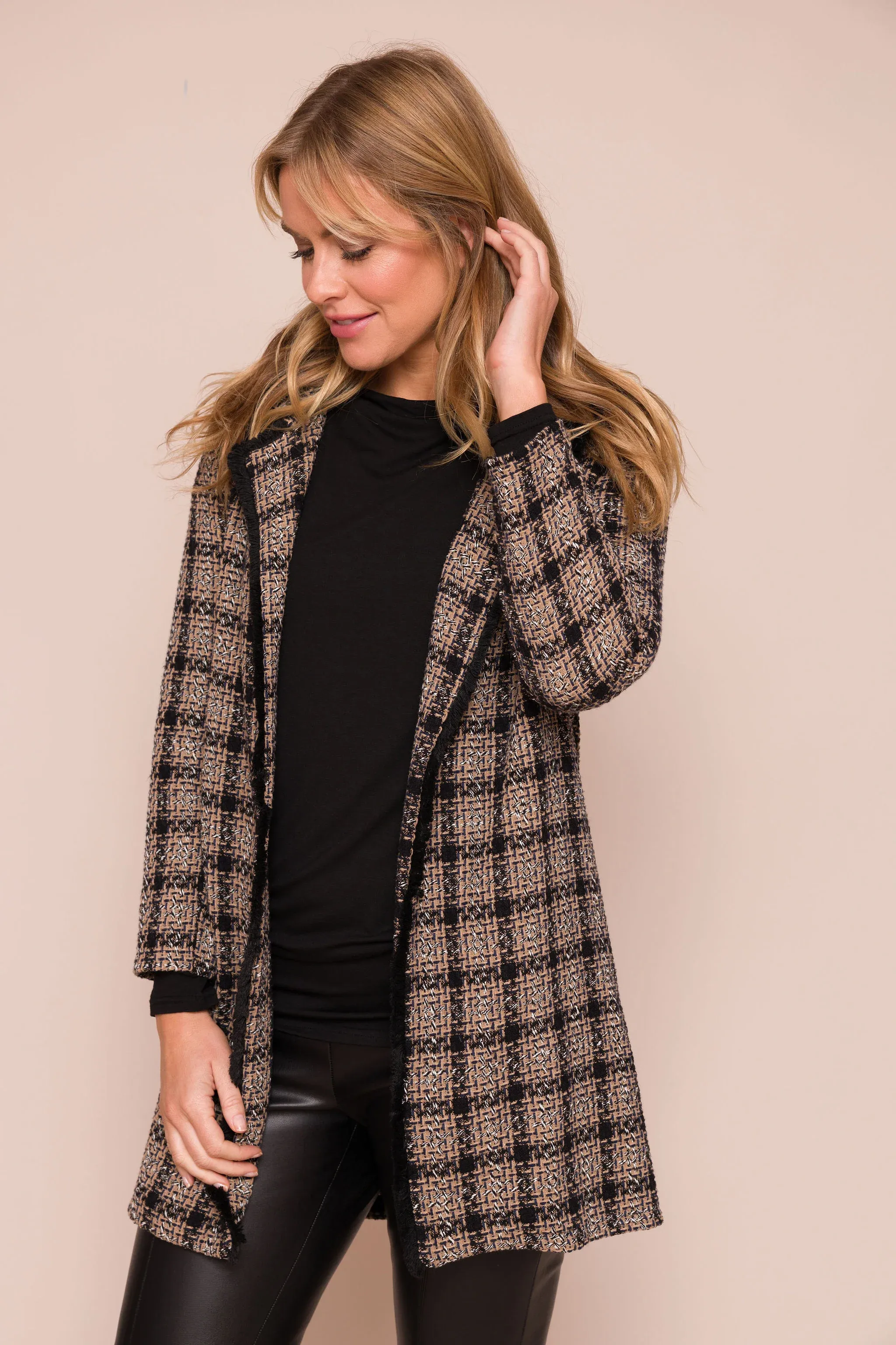 Sure! Here’s an optimized title for the e-commerce product:

Chic Galia Suzy D Long Chanel-Inspired Jacket for Women – Elegant and Stylish Outerwear

This title adds modifiers to enhance searchability and appeal.